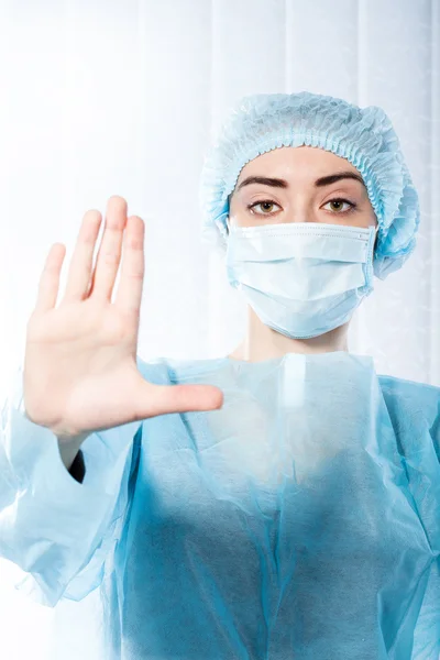 Portrait female doctor shows stop his hand — Stock Photo, Image