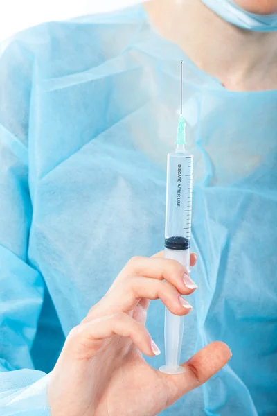 Portrait of woman doctor, surgeon with syringe — Stock Photo, Image