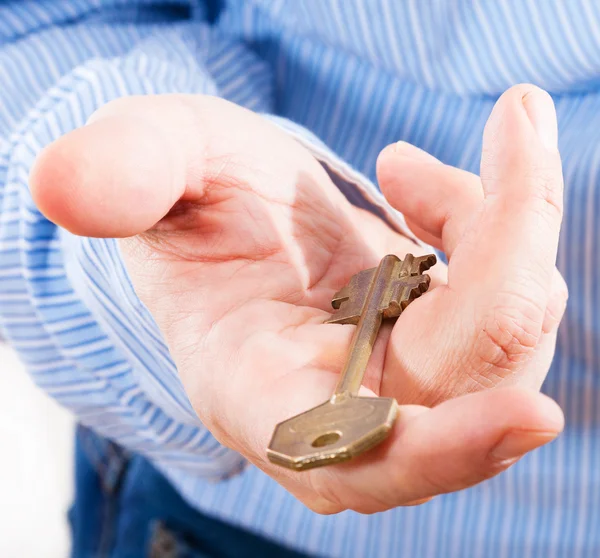 Key in hand businessman. — Stock Photo, Image