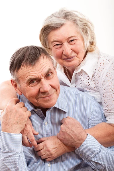 Closeup portrait of smiling elderly couple — Stock Photo, Image