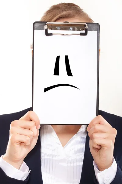 Business woman shows signs on white billboard — Stock Photo, Image