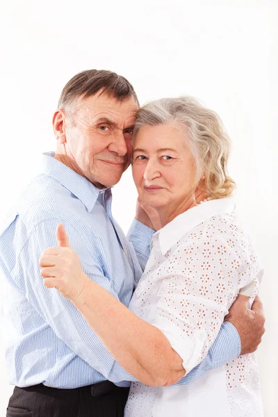 Portrait of smiling elderly couple — Stock Photo, Image