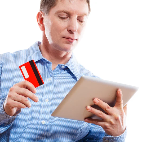 Retrato de un joven sosteniendo una tableta — Foto de Stock