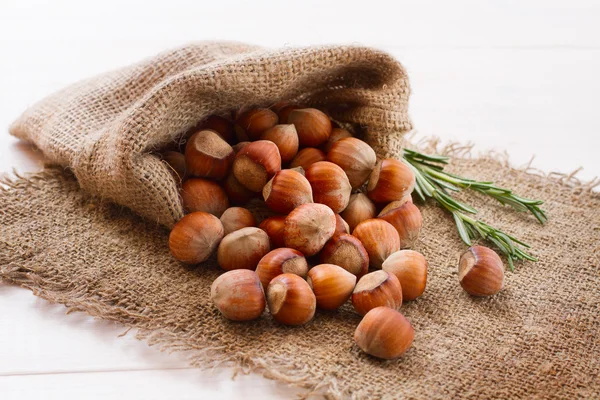 Hazelnuts, filbert on old wooden background — Stock Photo, Image