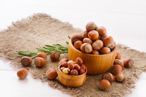 Hazelnuts, filbert on old wooden background — Stock Photo, Image