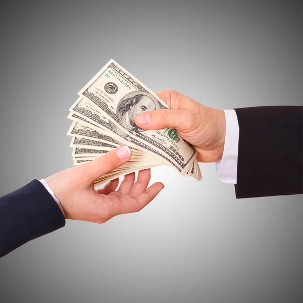 Affärsman innehar kontanter dollar i händerna — Stockfoto
