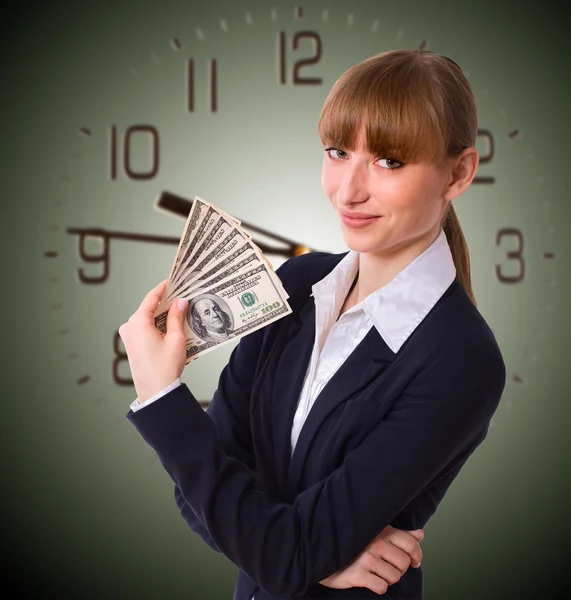 Mujer de negocios sosteniendo dólares en efectivo — Foto de Stock