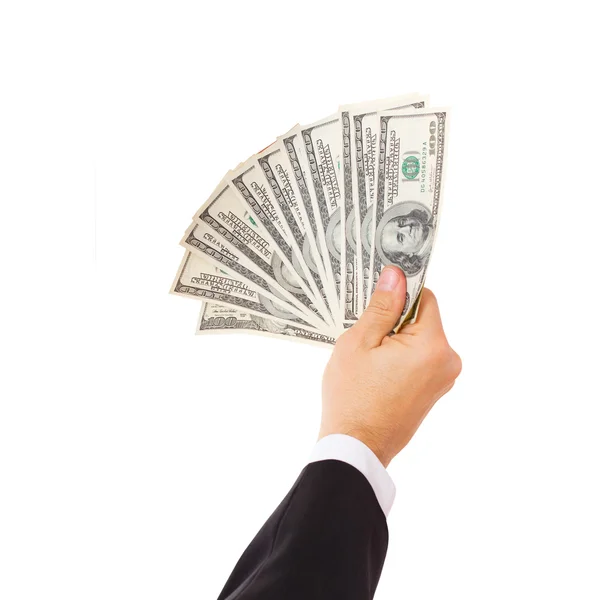 Бизнесмен дает деньги наличными долларов в руки — стоковое фото