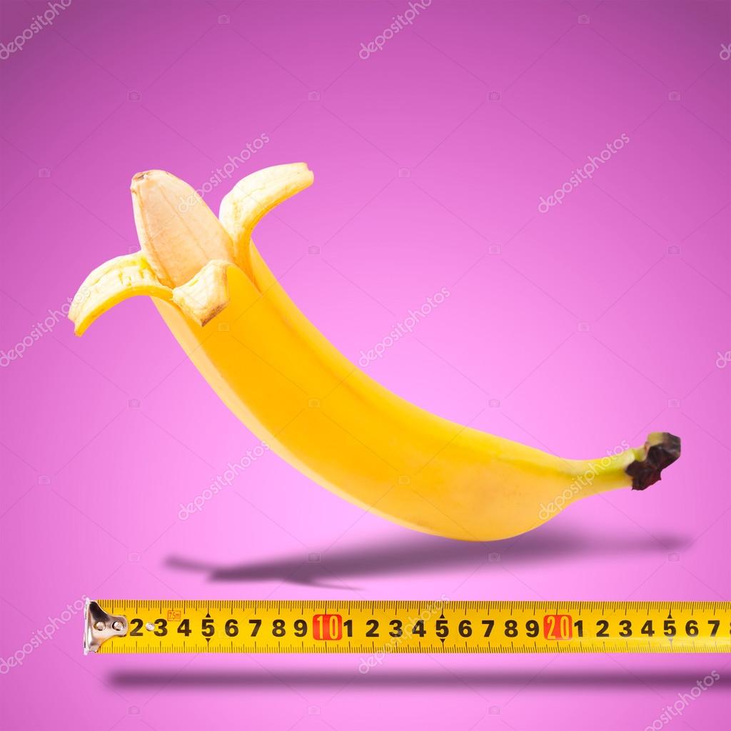 Large banana and measuring tape — Stock Photo © victoreus 40347041