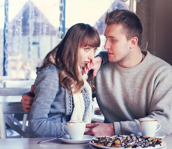 Family is drinking coffee in cafe — Stock Photo, Image