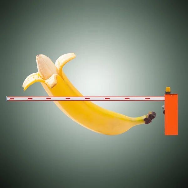 Large banana and measuring tape as image of man's penis — Stock Photo, Image