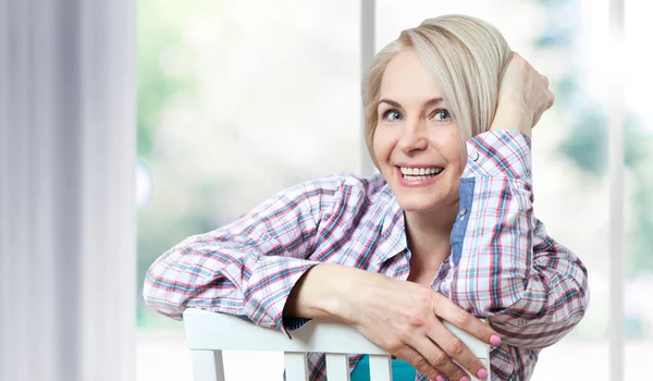 Happy Middle Aged Woman Looking Relaxed Camera Sitting Window Beautiful — Stock Photo, Image