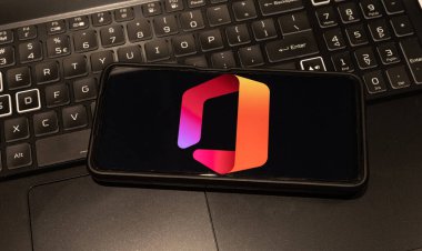 microsoft office logo on mobile phone , background is a keyboard  , Sydney Australia July 30 2022