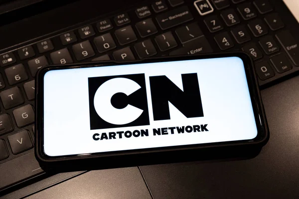 Cartoon network logo on smartphone screen , background is a keyboard  , Sydney Australia July 30 2022