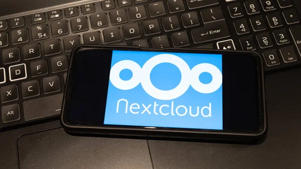 nextcloud logo on mobile phone  , background is a keyboard  , Sydney Australia July 30 2022