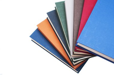 bir sarmal içinde yığılmış kitaplar