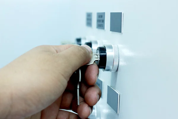 Key in panel — Stock Photo, Image