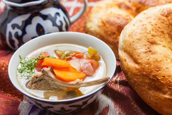 Uzbek national food on traditional fabric — Stock Image Uzbek national food on traditional fabric Royalty Free Stock Images
