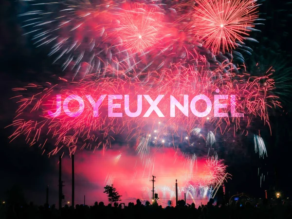 Joyeux Noel κάρτα σε φόντο πυροτεχνήματα — Φωτογραφία Αρχείου