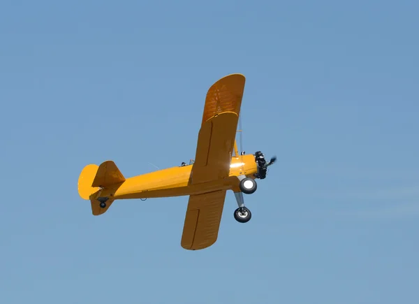 Retro biplane flying — Stock Photo, Image