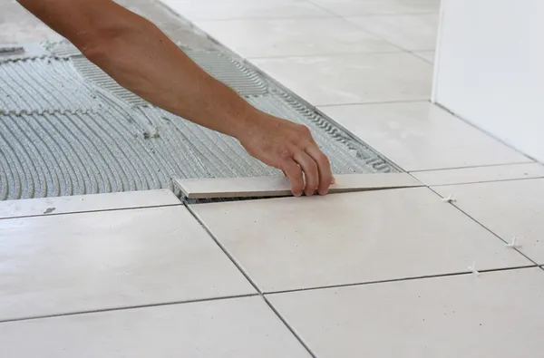 Laying small cut tile — Stock Photo, Image