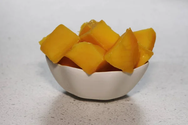 Luscious Fresh Cut Mango White Dish — стоковое фото