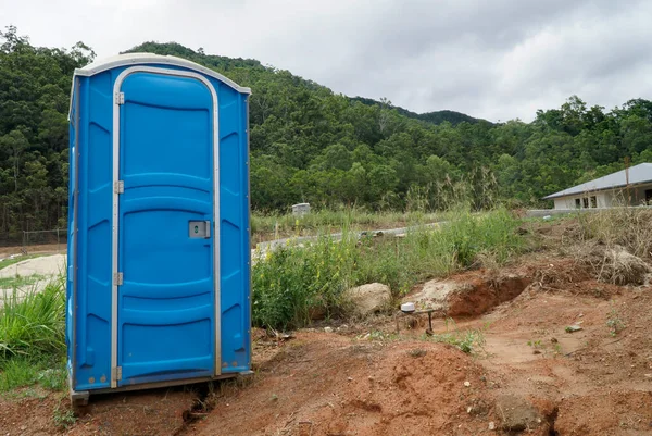 A portable toilet cabin at construction site