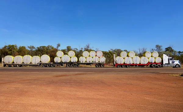 Road train carrying bales of cotton in the Northern Territory Australia