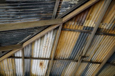 old rusty roofing iron looking upward to the ceiling