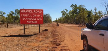 traveling on a dirt road crossing a cattle grid in Northern Territory border