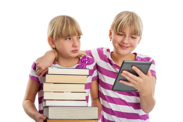 Books vs ebook reader — Stock Photo, Image