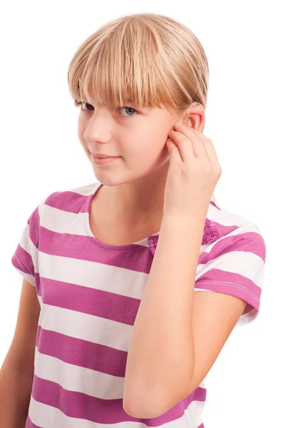 Young Girl setting her hearing aid — Stock Photo, Image