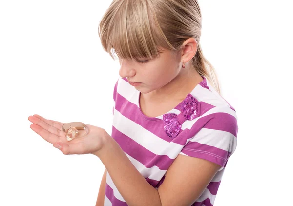 Showing a hearing aid — Stock Photo, Image