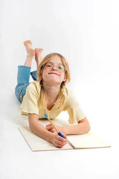 Girl taking notes — Stock Photo, Image