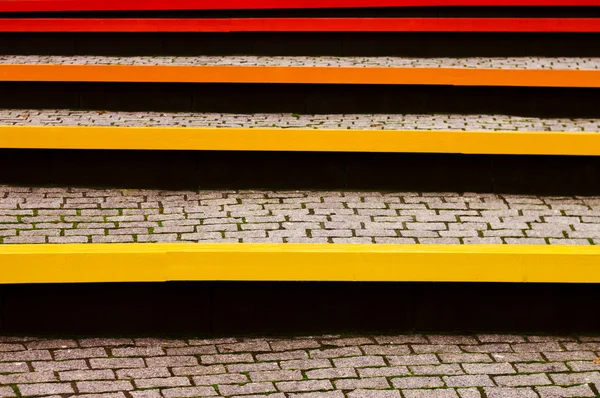 Colored benches and pavers — Stock Photo, Image