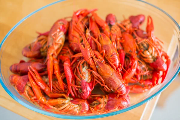 Red boiled crawfish in clear glass bowl — Stock Photo, Image