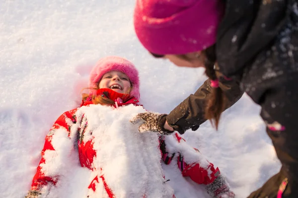 Girl sprinkled with snow — Stock Photo, Image