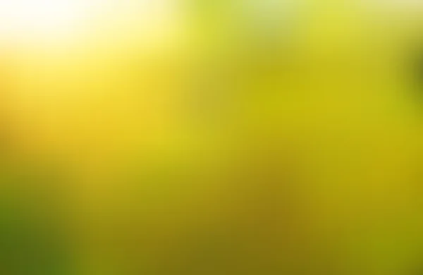 緑ぼやけた抽象的背景 — ストックベクタ