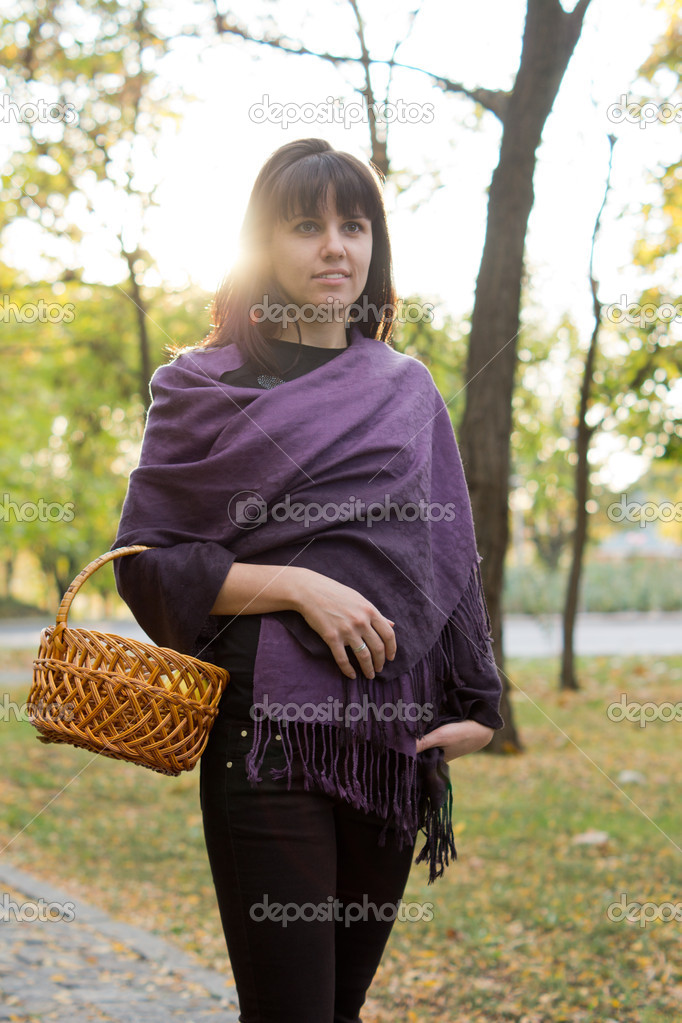 Woman walking with a basket