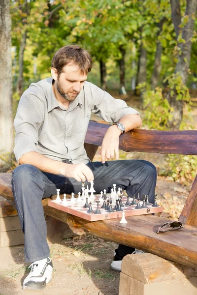 Chess player making a move — Stock Photo, Image