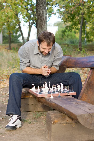 Chess player planning his strategy — Stock Photo, Image