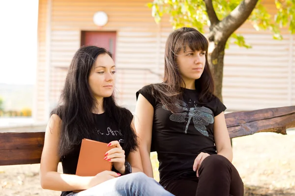 Two thoughtful looking women — Stock Photo, Image