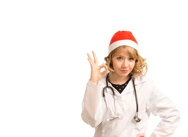 Sexy blonde doctor in a Santa hat — Stock Photo, Image