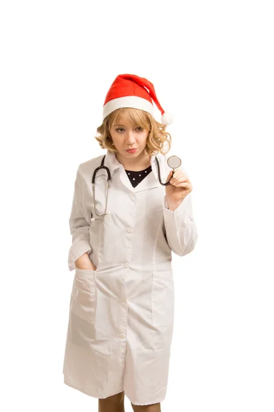 Blonde nurse in a Santa Claus hat — Stock Photo, Image