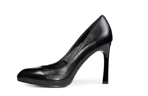 Womans elegant black leather stiletto shoe — Stock Photo, Image