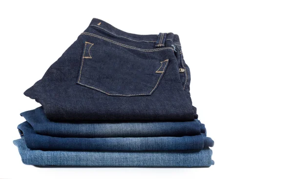 Högen av denim jeans — Stockfoto