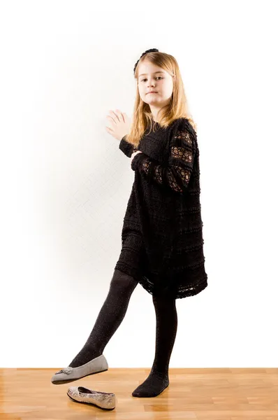 Little girl showing off her new shoes — Stock Photo, Image