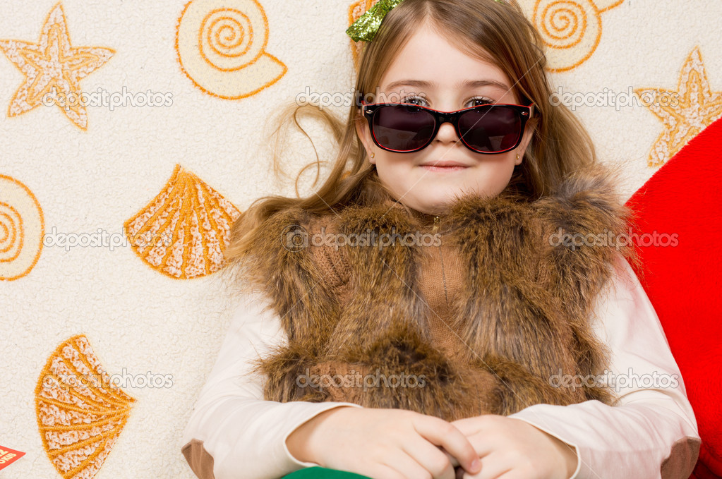 Young girl posing large sunglasses