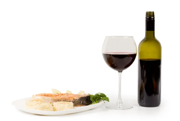 Serving of salmon and red wine — Stock Photo, Image