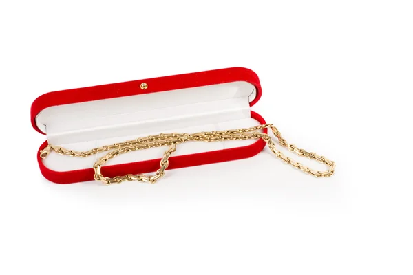Golden elegant necklace in a red box — Stock Photo, Image